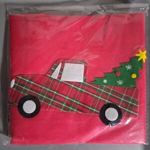 Festive Pink Holiday Napkin with Plaid Truck Design